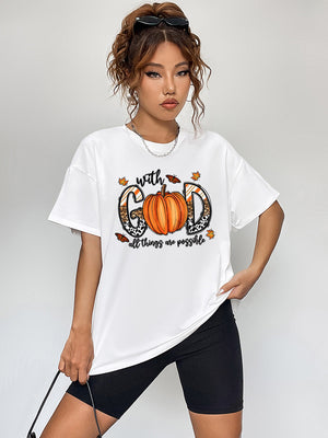 White graphic t-shirt with pumpkin and text print