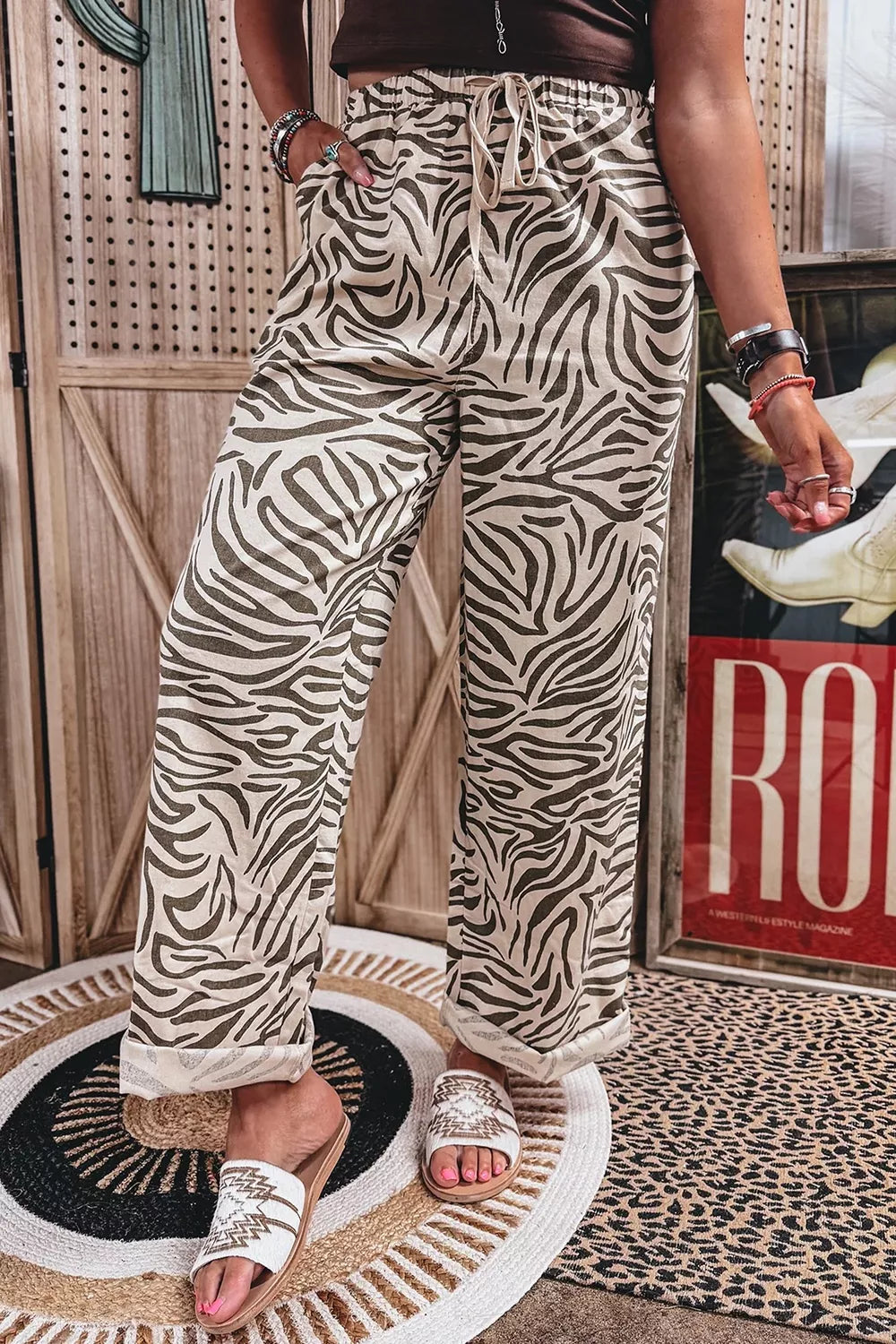 wide-leg pants featuring zebra-print in Mocha with 100% polyester Care instructions: Machine wash cold texture