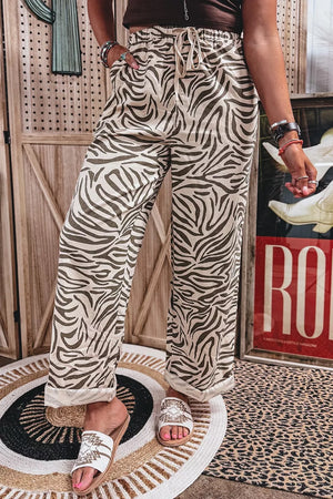 wide-leg pants featuring zebra-print in Mocha with 100% polyester Care instructions: Machine wash cold texture