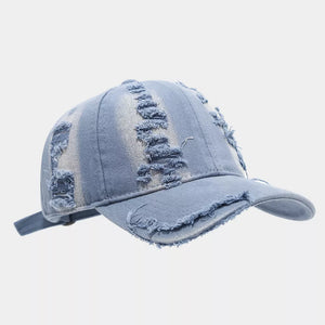 cap in light blue featuring distressed and fitted fit