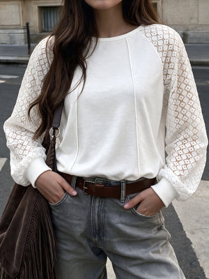 White sweatshirt featuring openwork and geometric