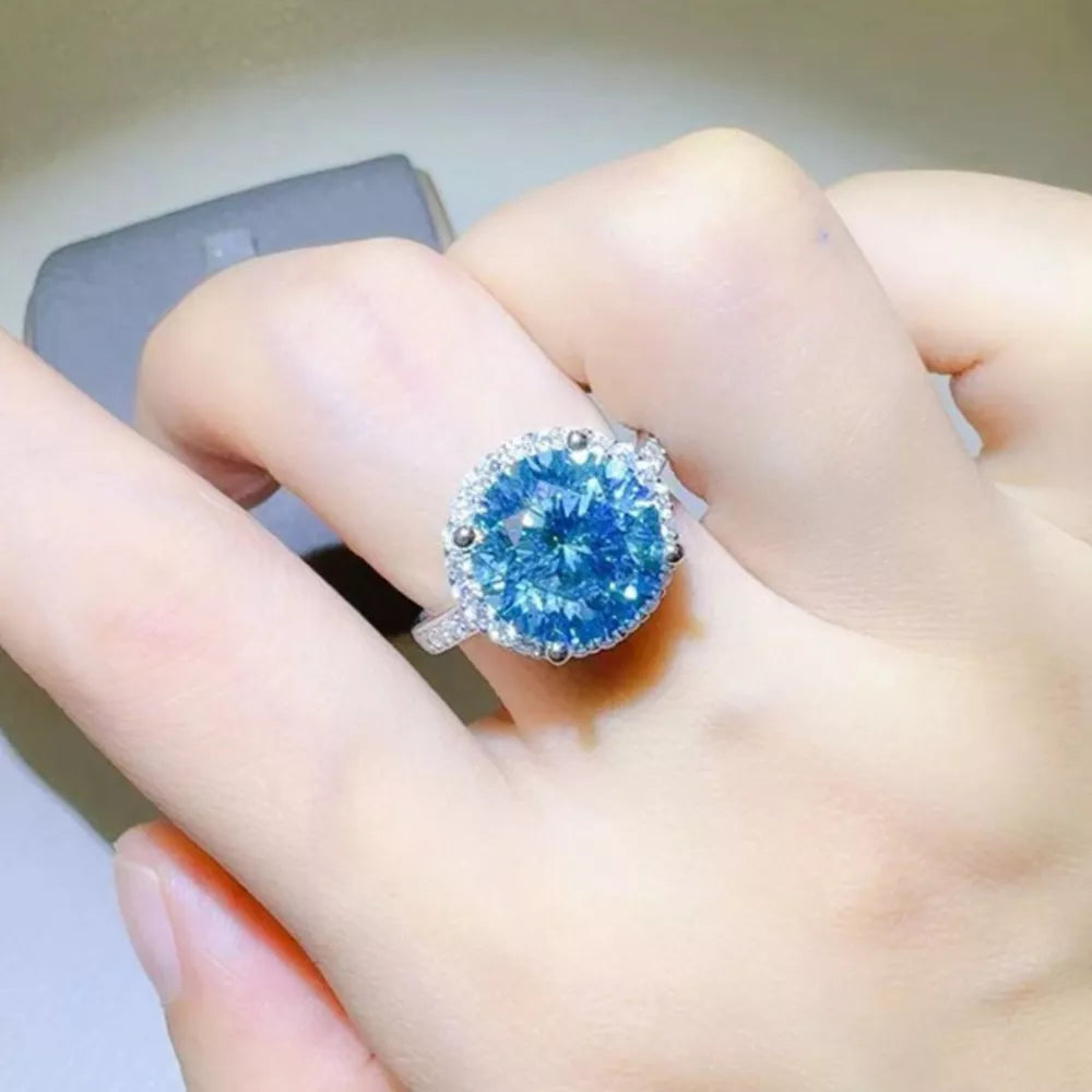 ring in light blue featuring halo setting and jewelry fit