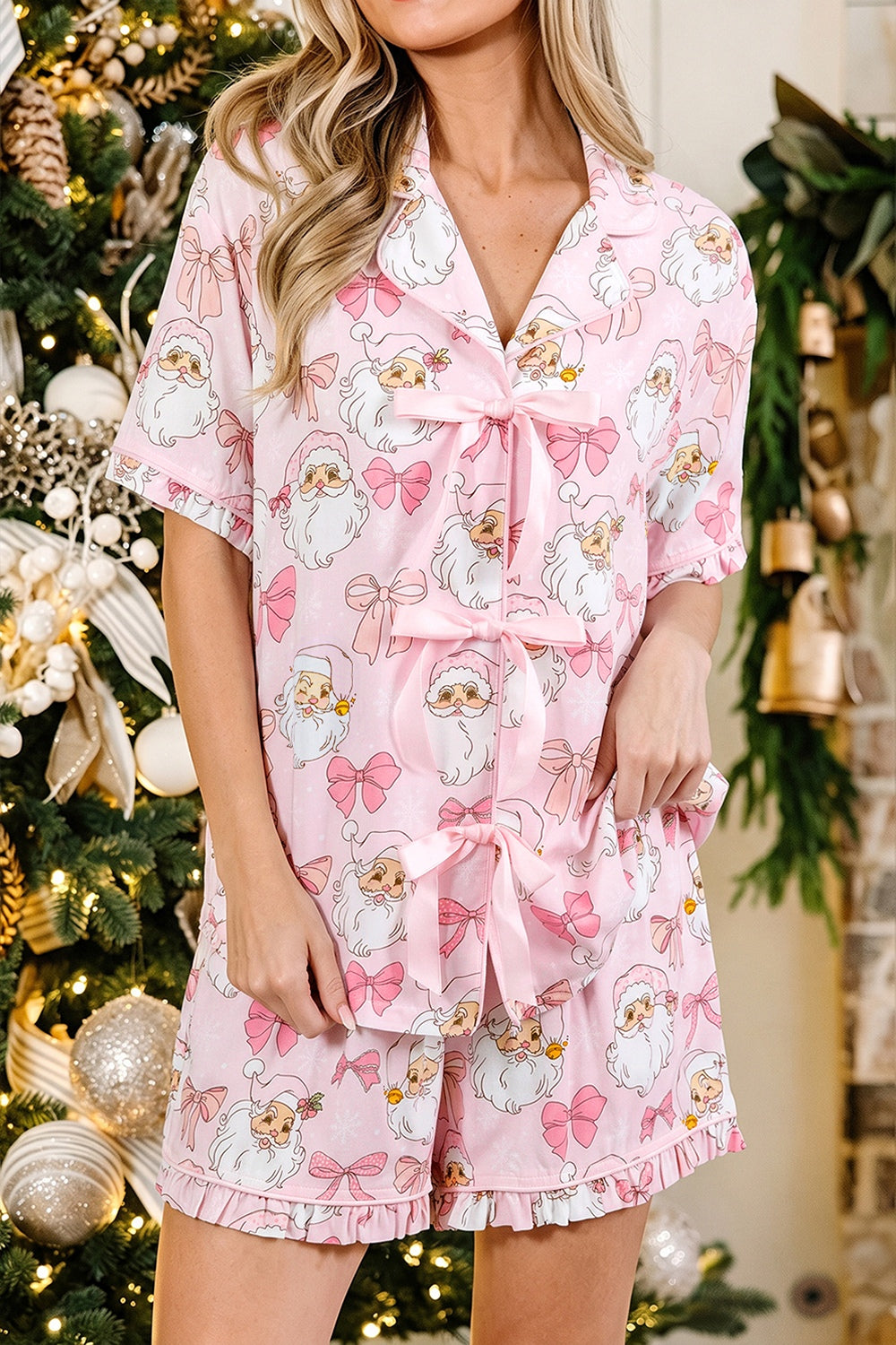 light pink pajama set with Santa print and collared