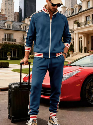 Men's French Blue tracksuit with white and red stripe accents on sleeves and legs.