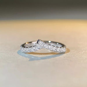 ring in silver featuring zircon embellishment and irregular band fit