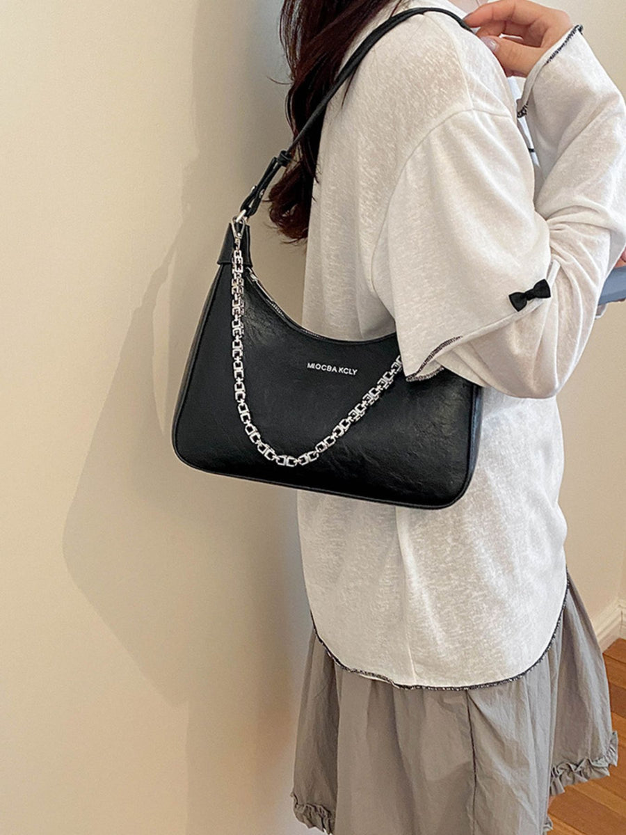 black with handbag with chain detail