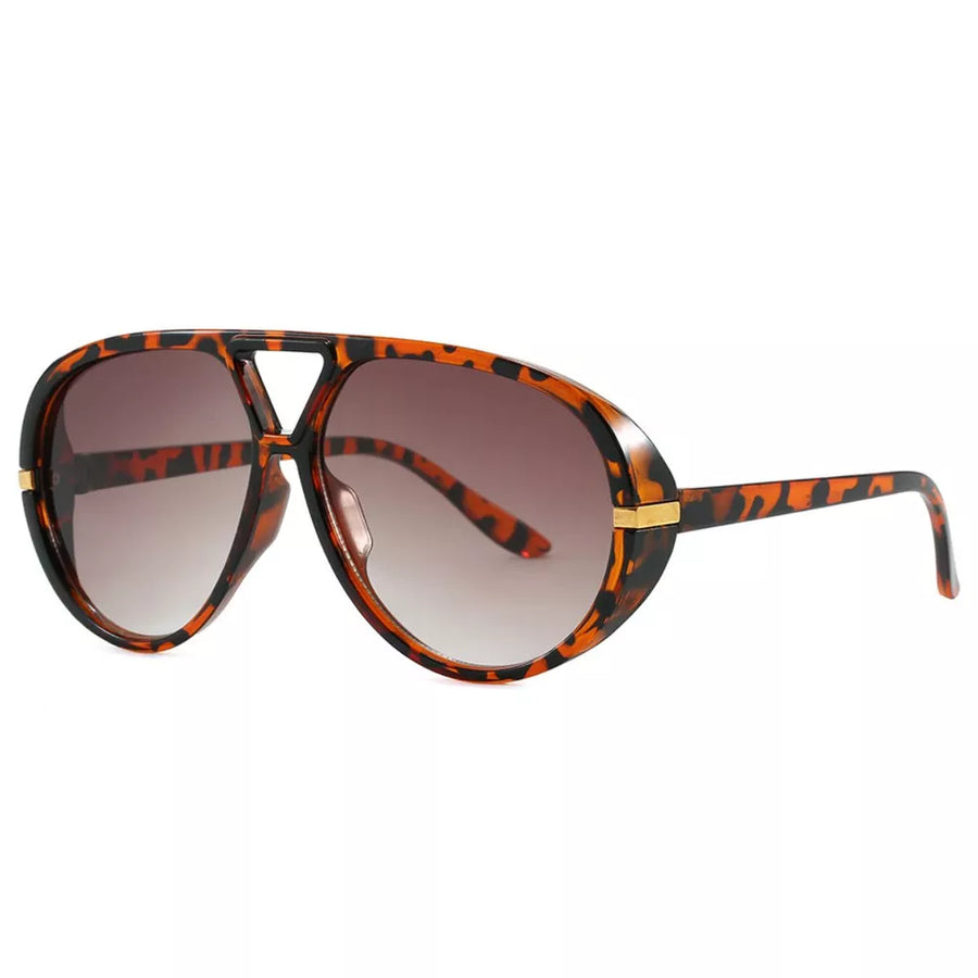 PC Frame material: Polycarbonate Lens material: Polycarbonate Temple material: P sunglasses in Caramel with oversized