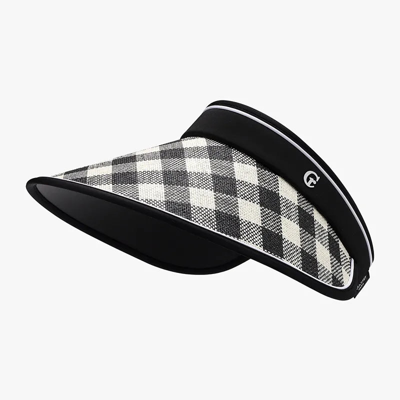 Gingham visor with adjustable strap in black and white.