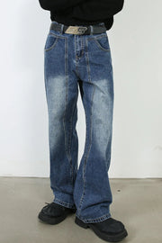 Panel seam wide leg denim jeans in medium wash, featuring a faded effect and a relaxed fit.