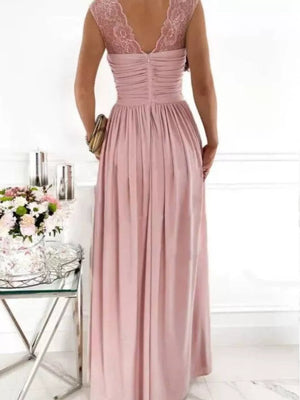 Dusty pink maxi dress with lace cap sleeves and ruched bodice.