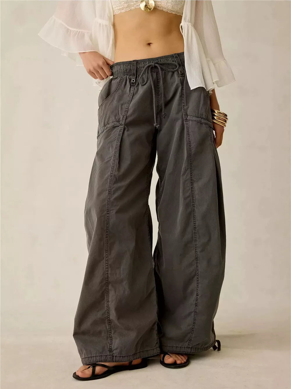cargo pants in charcoal featuring high-waisted and wide-leg fit
