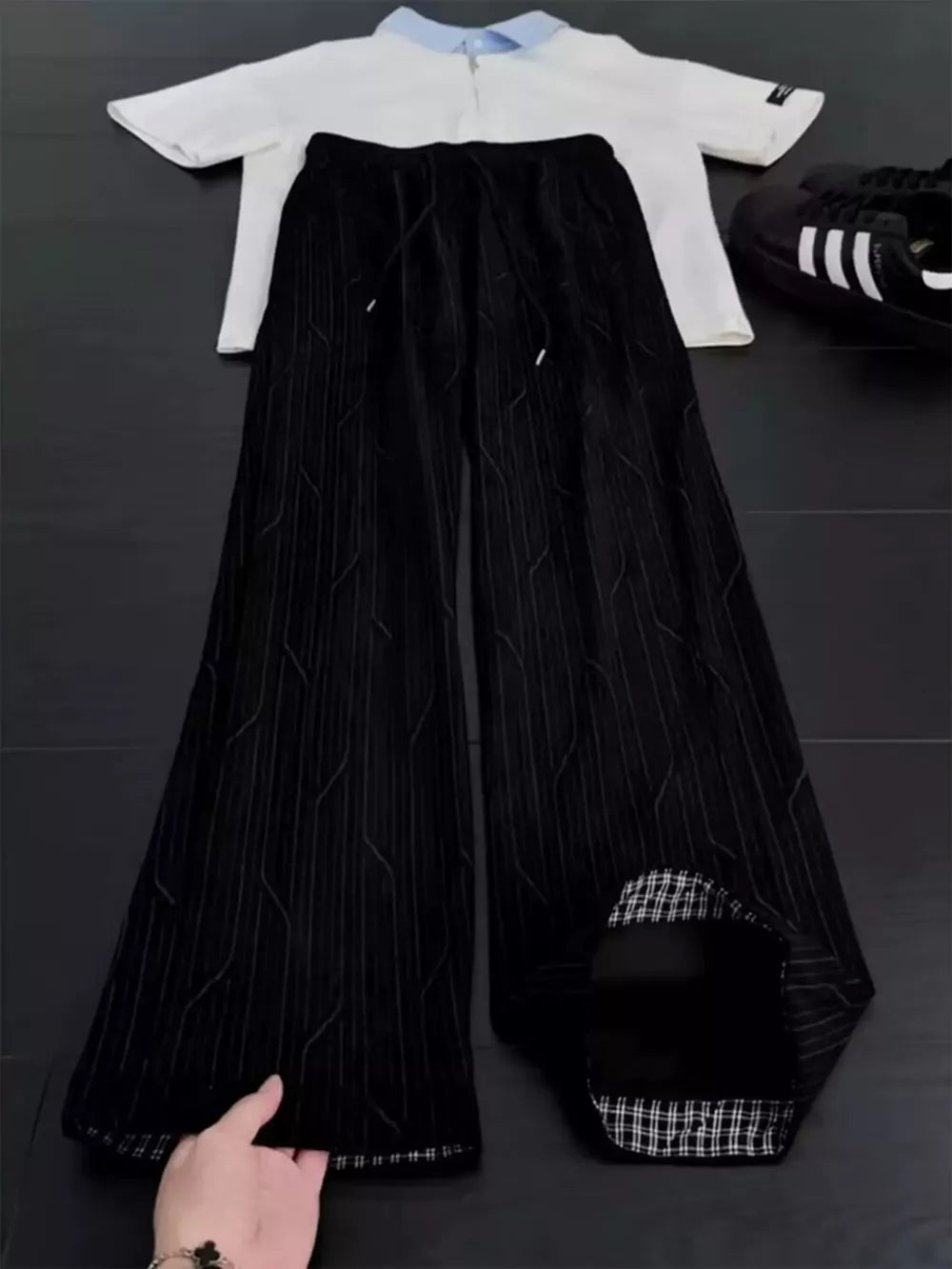 95%polyester, 5%spandex Care instructions: Machine wash cold wide-leg pants in Black with wide-leg silhouette