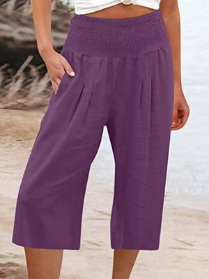 Purple cropped pants with smocked waist and pockets
