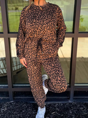 Leopard print loungewear set with drawstring joggers and long sleeve top.