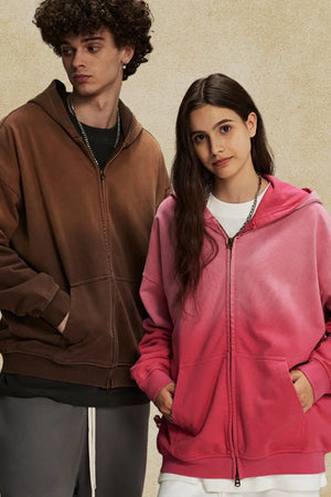 Oversized zip-up hoodie in coffee brown and hot pink with vintage wash and front pockets.