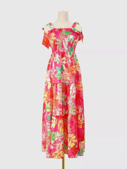 Tropical tie-strap smocked midi dress in strawberry with floral print, tiered skirt and ruffled neckline.