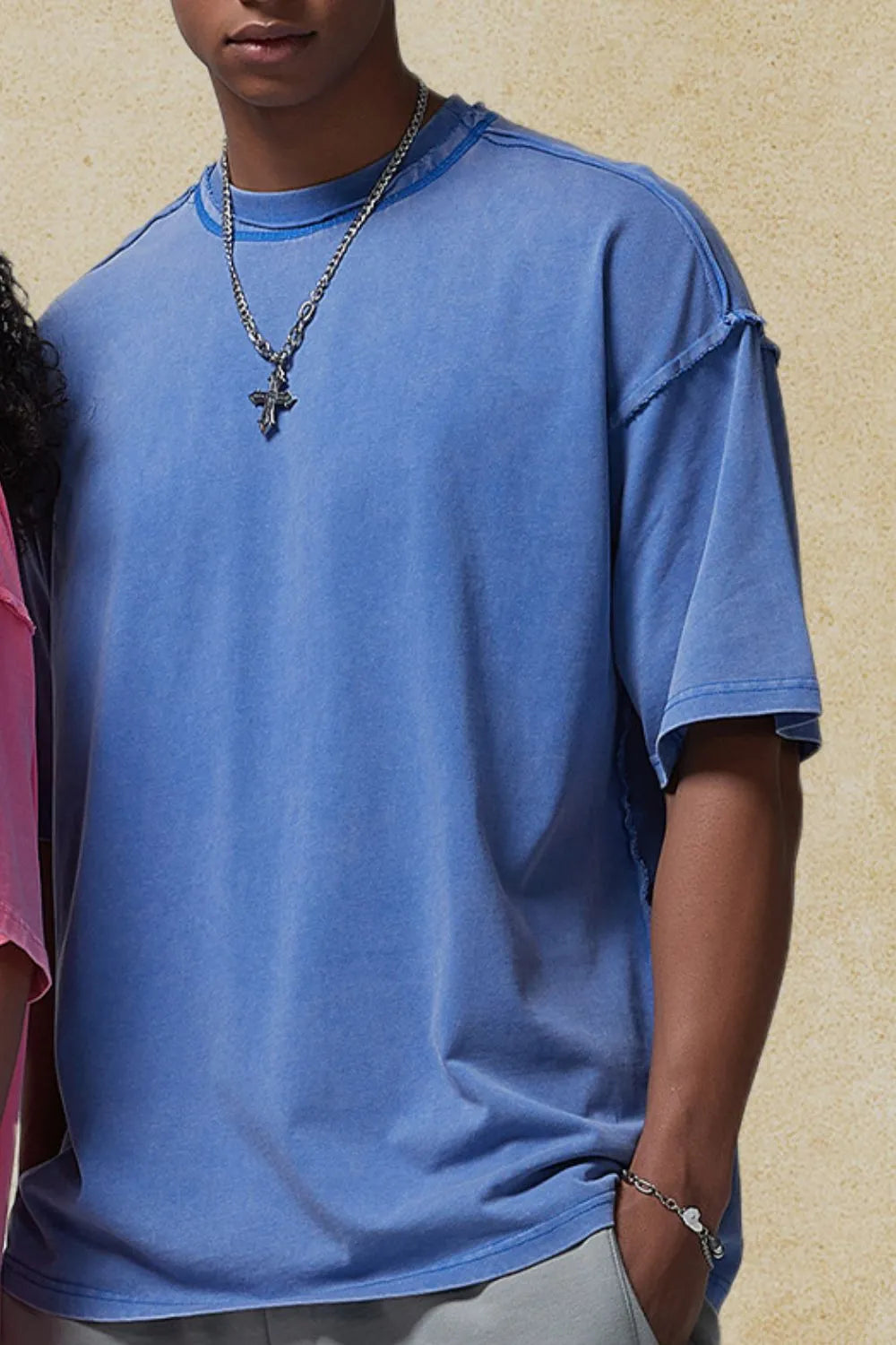 Blue washed cotton tee with raw seams and distressed edges.