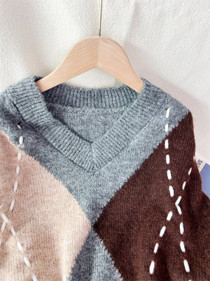 Brown v-neck sweater with pullover and argyle