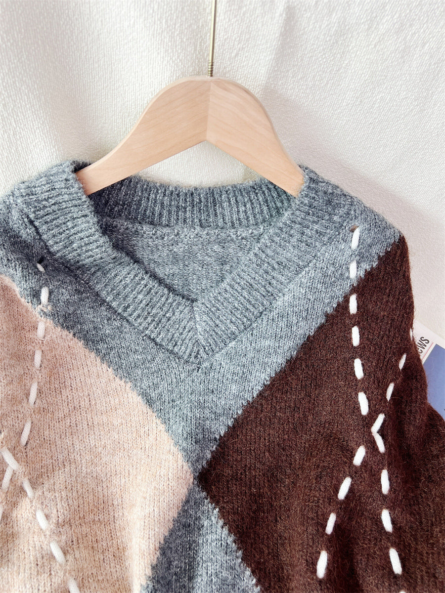 Brown v-neck sweater with pullover and argyle