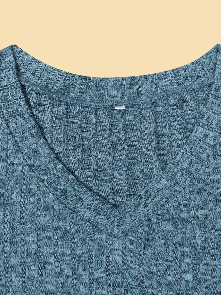 Blue textured V-neck knit long-sleeve top with a ribbed pattern.
