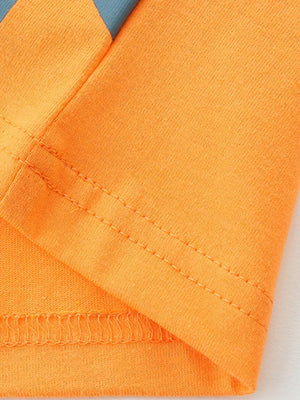 Orange cotton toddler t-shirt with blue stripe detail and reinforced stitching.
