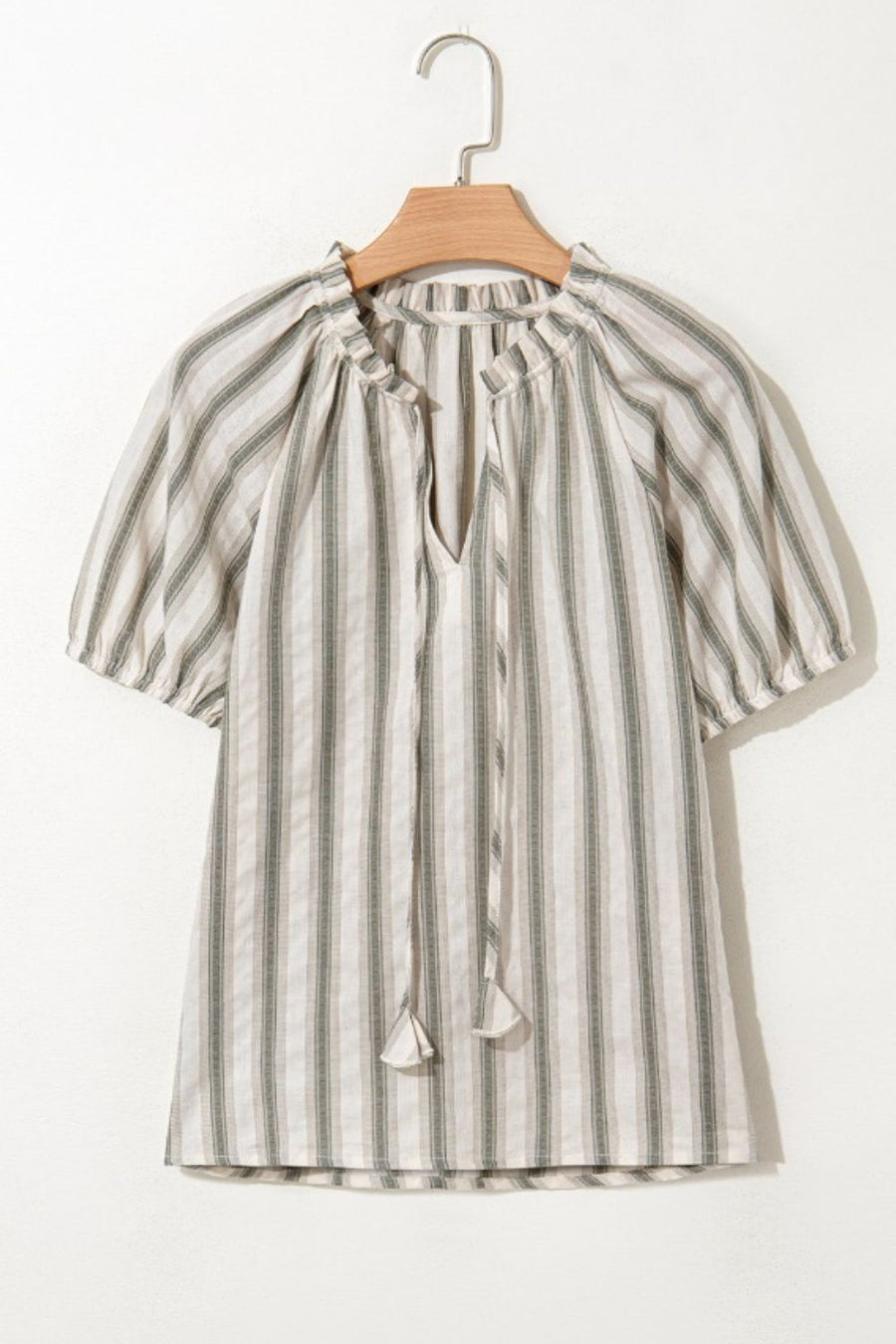 Striped linen blouse with gathered puff sleeves, V-neck, and tassel ties.
