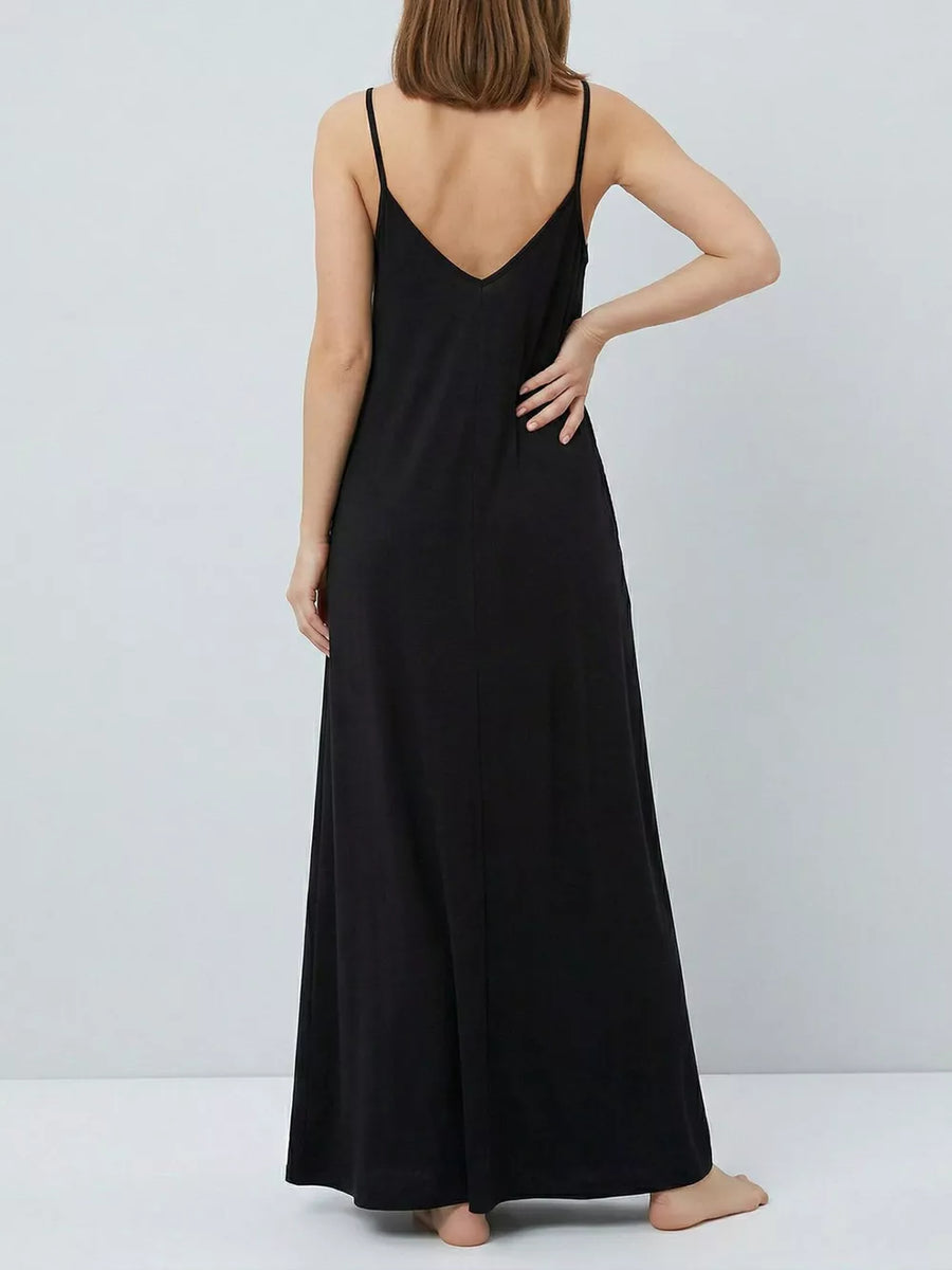 Black maxi dress with spaghetti straps and V-neck, flowing skirt.