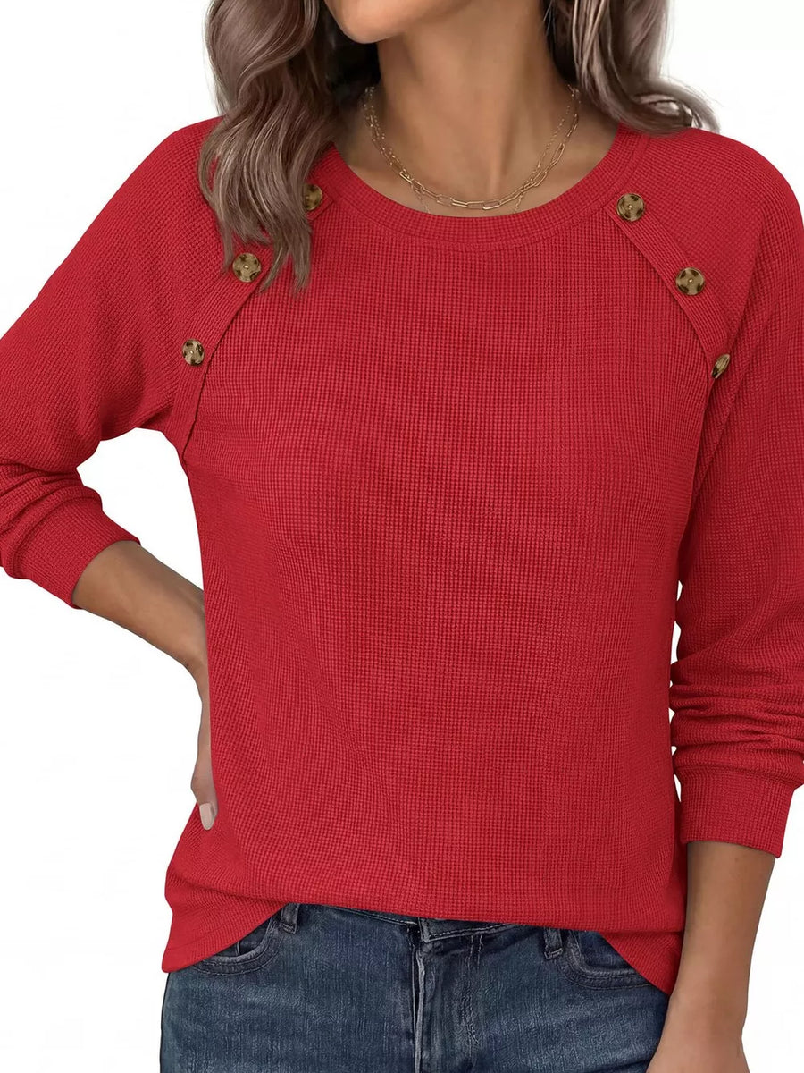 Blue t-shirt with decorative buttons and long sleeve