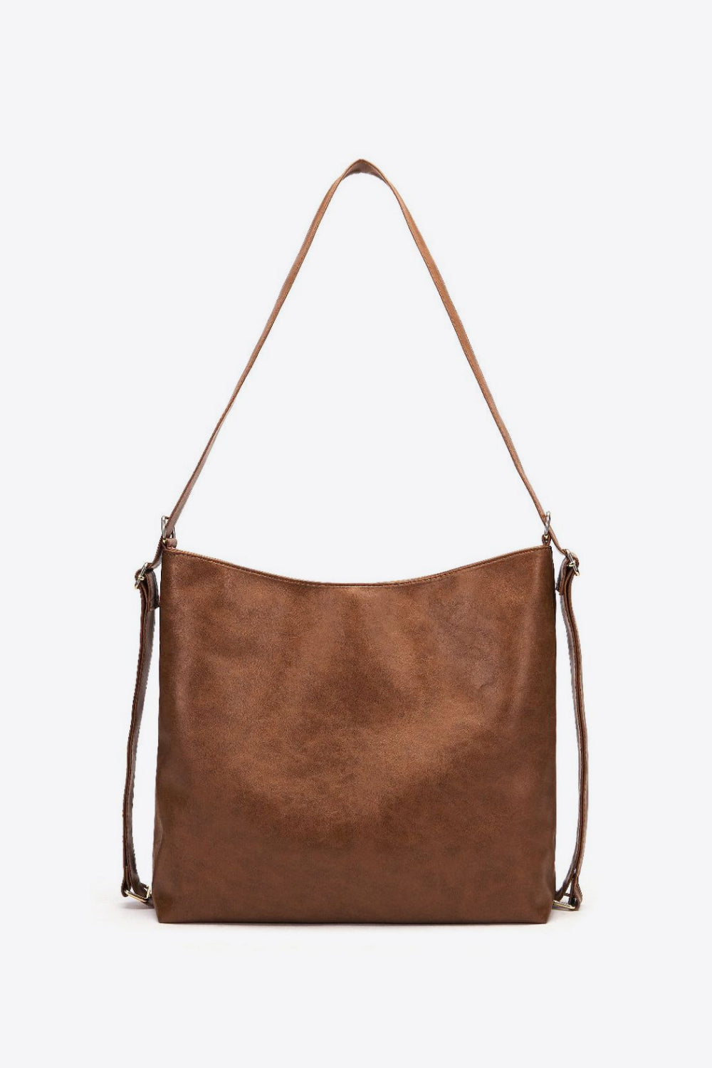 Earthy slouchy shoulder bag in chocolate brown leather with a relaxed silhouette and thin strap.