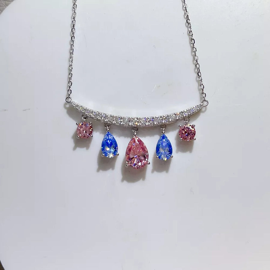 necklace in silver with teardrop moissanite charms and collar