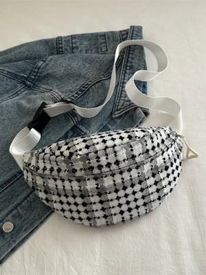 Textured houndstooth belt bag with adjustable white strap