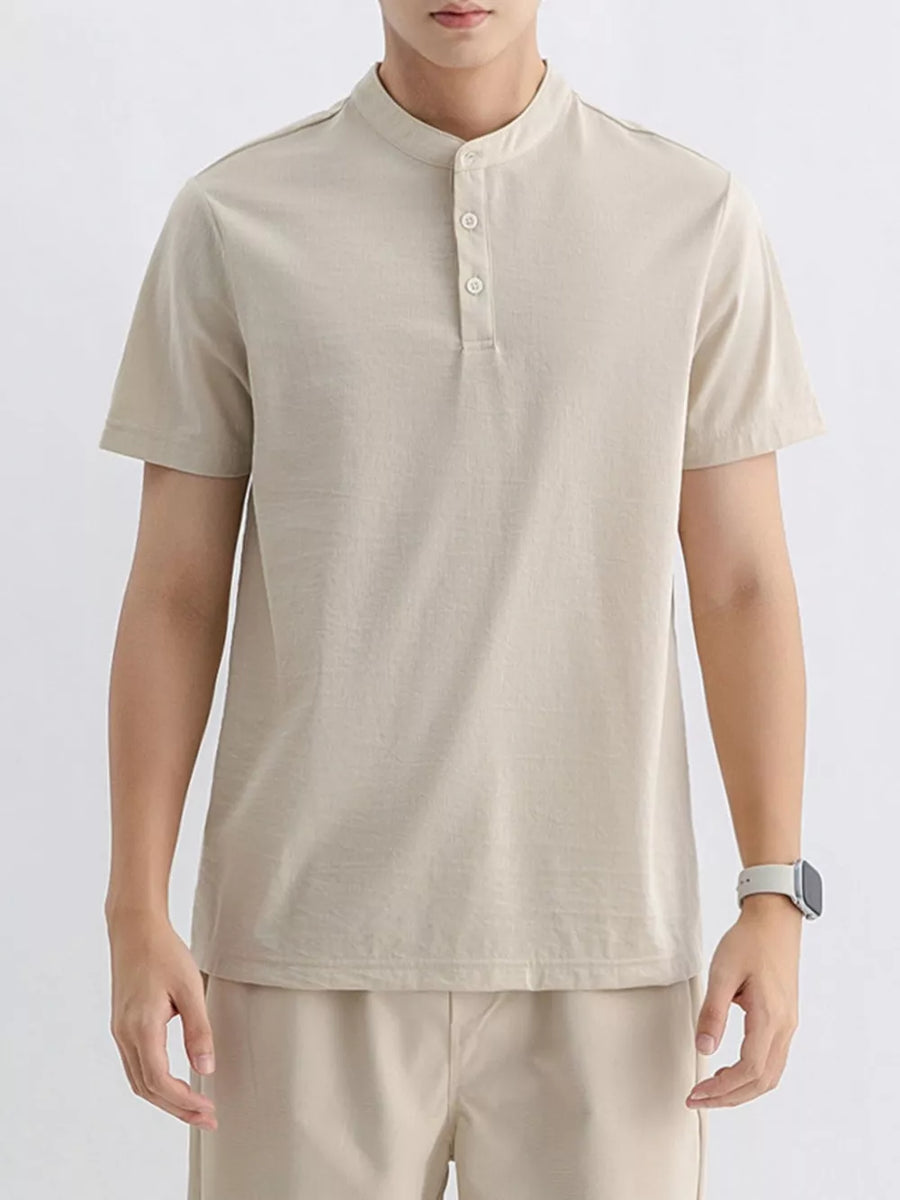 Apricot cotton t-shirt with short sleeves and a mandarin collar with button placket.