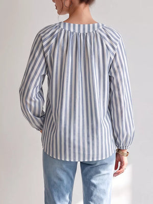 light blue blouse featuring lace-up and striped