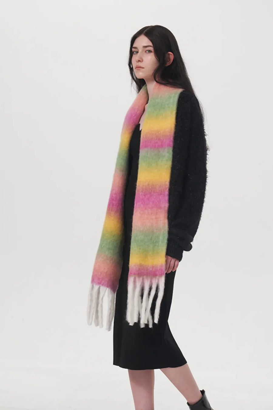 Gradient mohair scarf with fringe in pink, yellow, and green stripes.