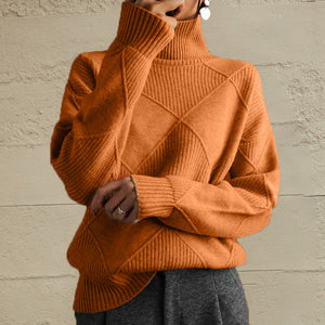 Textured diamond knit turtleneck pullover in caramel acrylic with ribbed cuffs and hem.