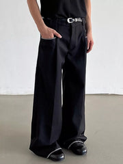 Black wide-leg pants with decorative trim on pockets and hem