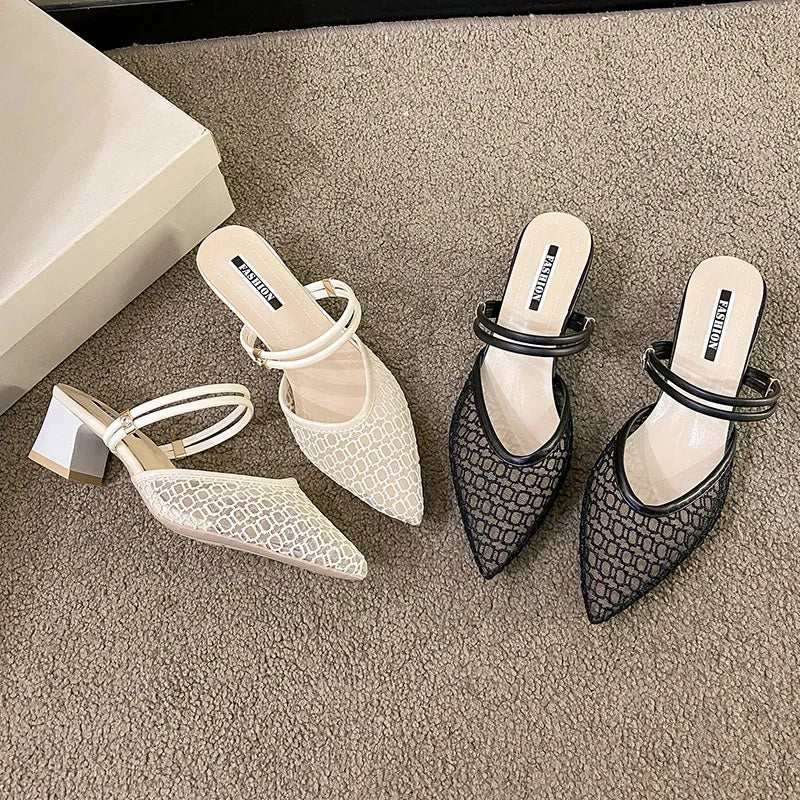 Lace slingback pointed-toe mules in ivory and black with double strap detail