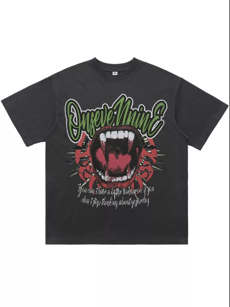Dark gray 100% cotton oversized t-shirt with a bold graphic of an open mouth with fangs and text.