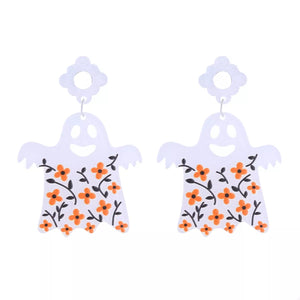 White acrylic ghost dangle earrings with orange floral pattern