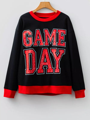 Black sweatshirt with red GAME DAY varsity lettering and red trim