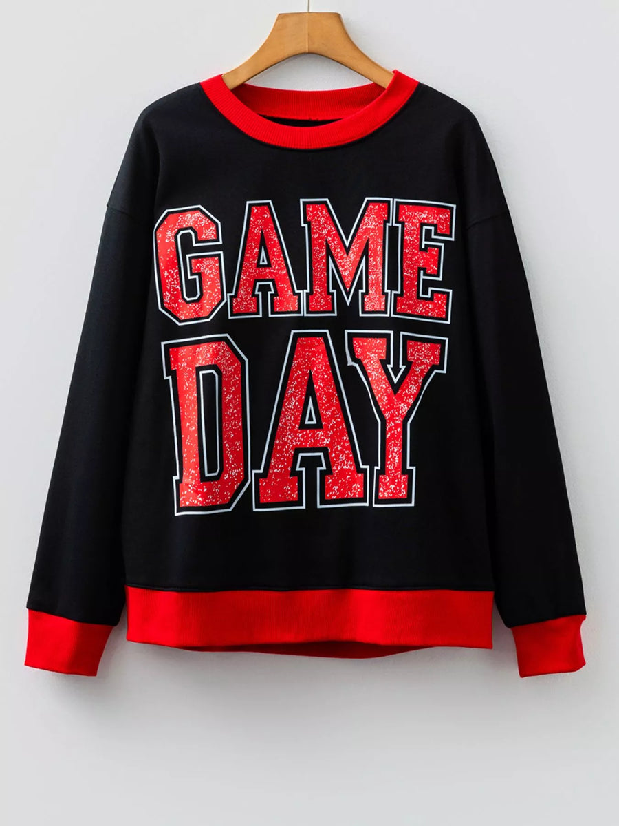 Black sweatshirt with red GAME DAY varsity lettering and red trim