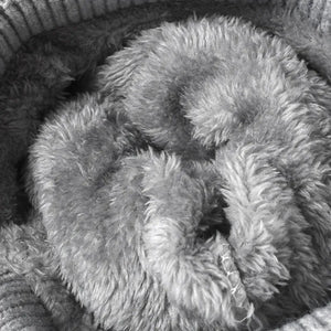 Gray knit beanie with fuzzy lining detail