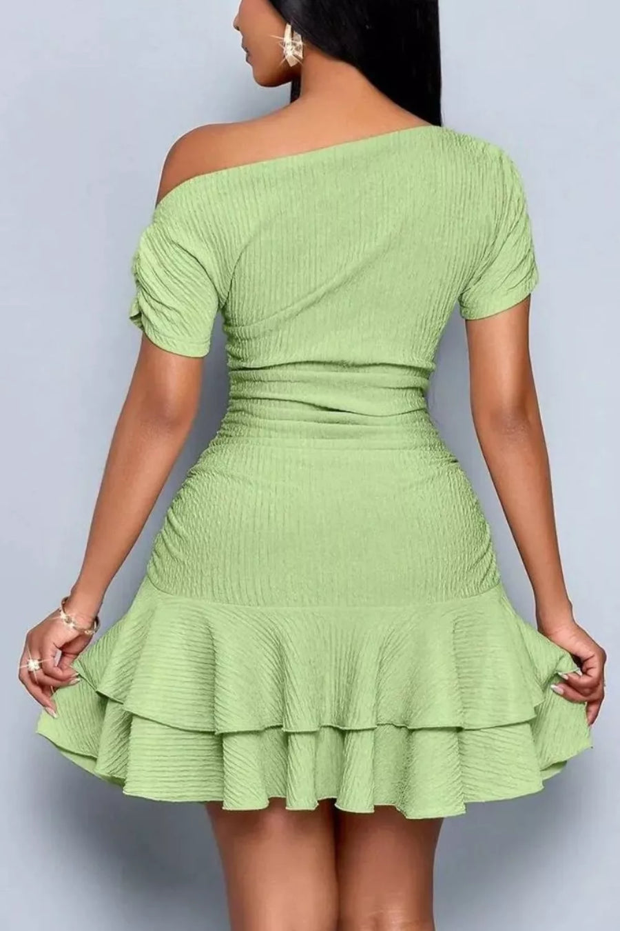 Gum Leaf one-shoulder tiered ruffle dress with ruched details and short sleeves.