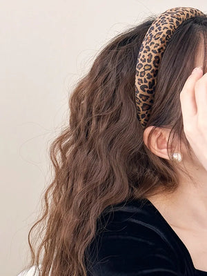 Leopard print padded headband in brown tan with a comfortable fit.