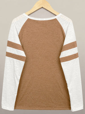 Black t-shirt featuring raglan sleeve and color-block