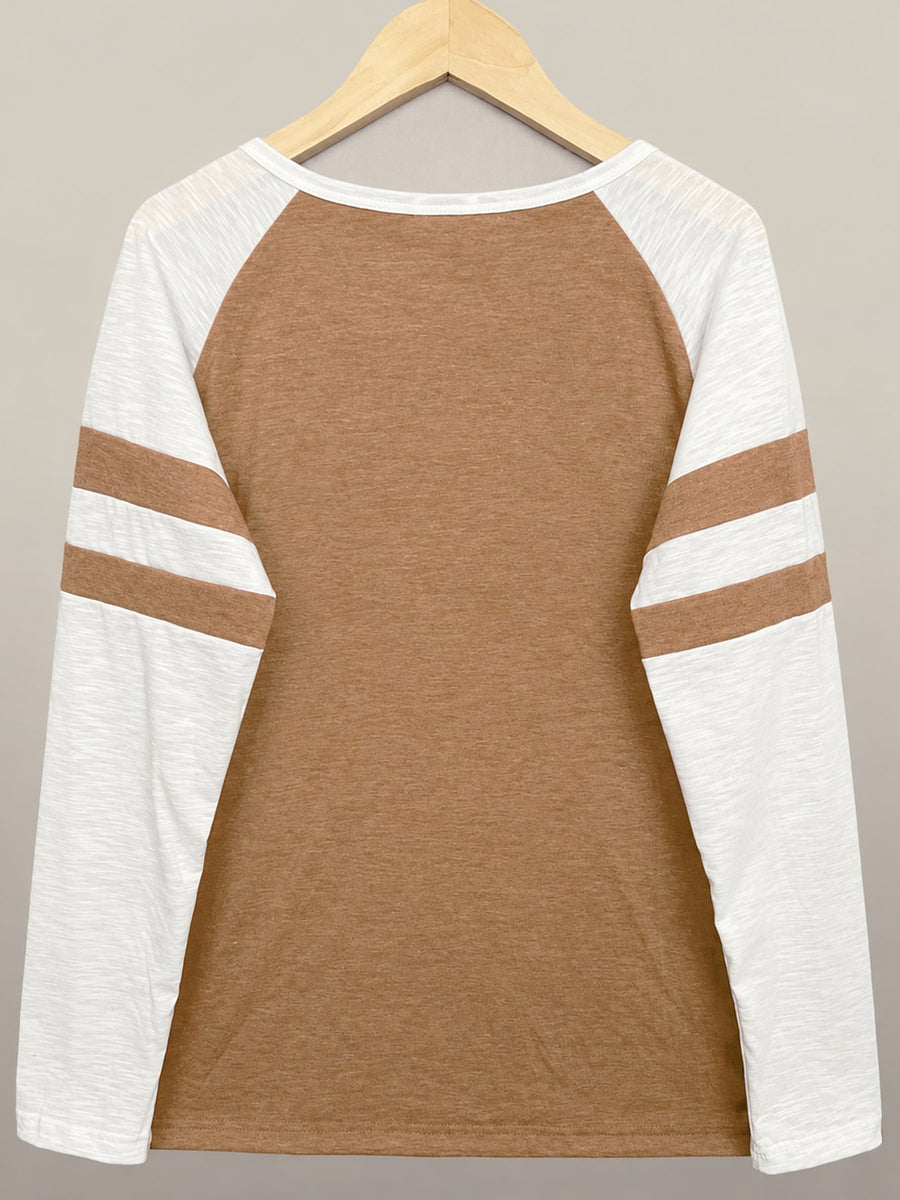 Black t-shirt featuring raglan sleeve and color-block