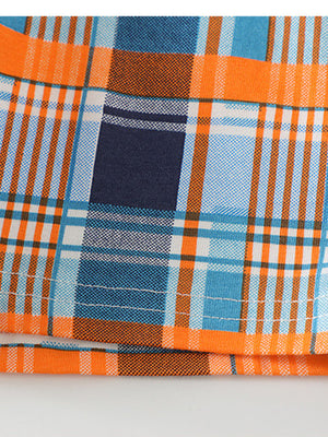 Toddler plaid shorts set in blue, orange, and white cotton with a cheerful pattern.