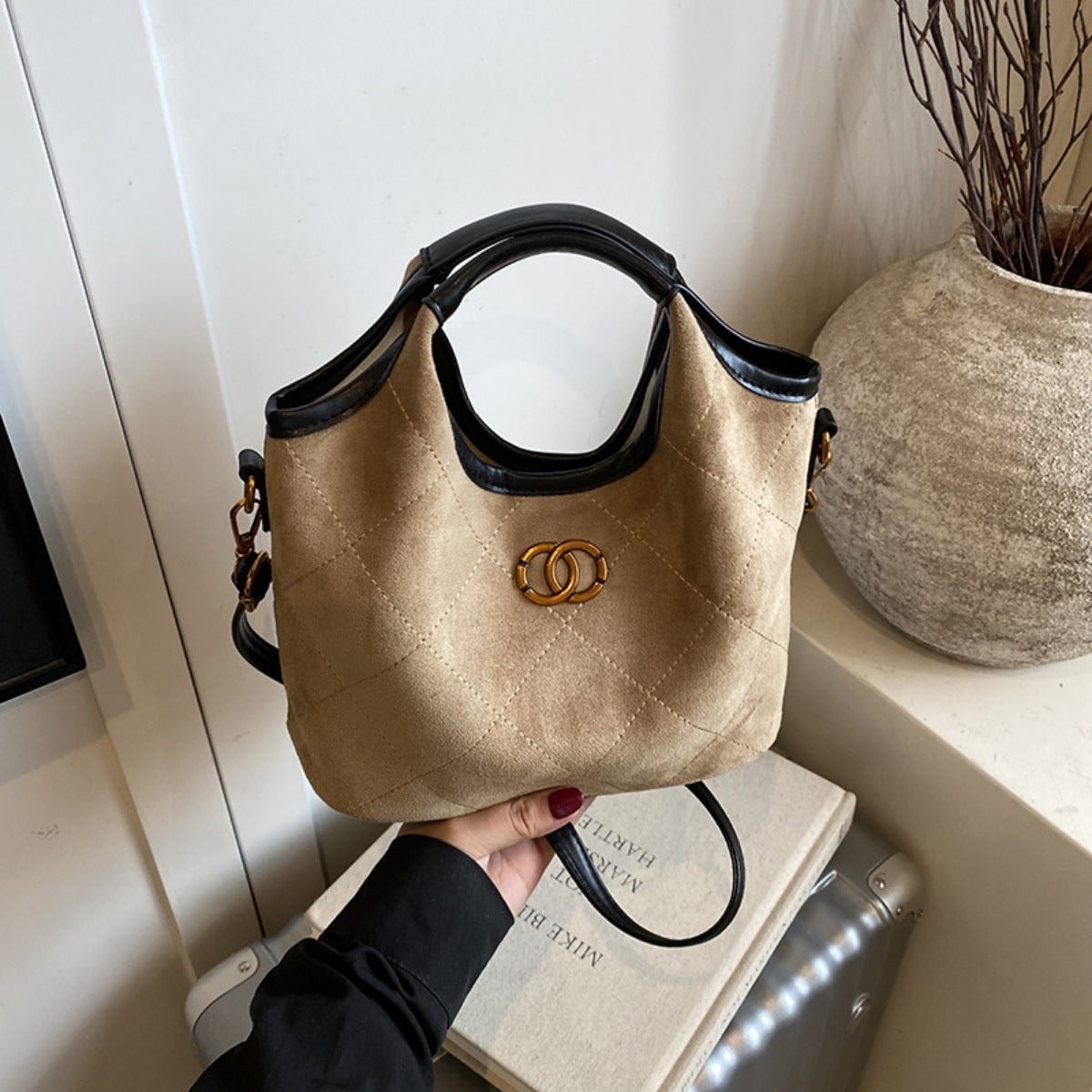 Quilted suede shopper bag in Khaki with diamond pattern and gold logo detail.