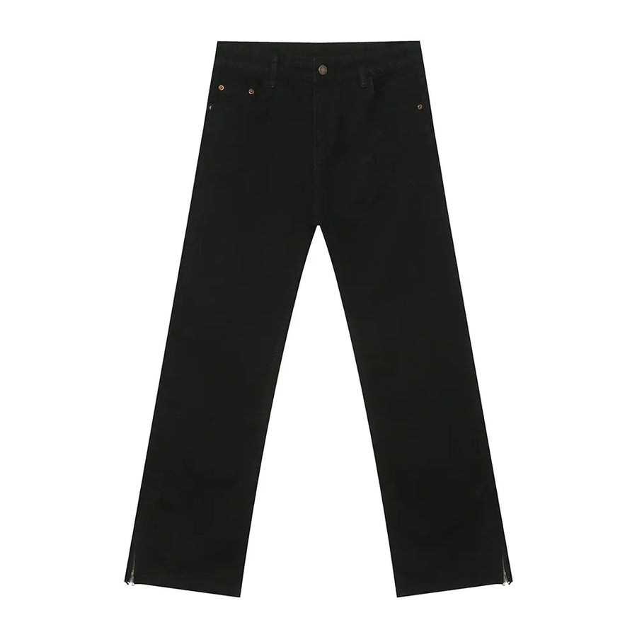 Black denim jeans with a split hem detail