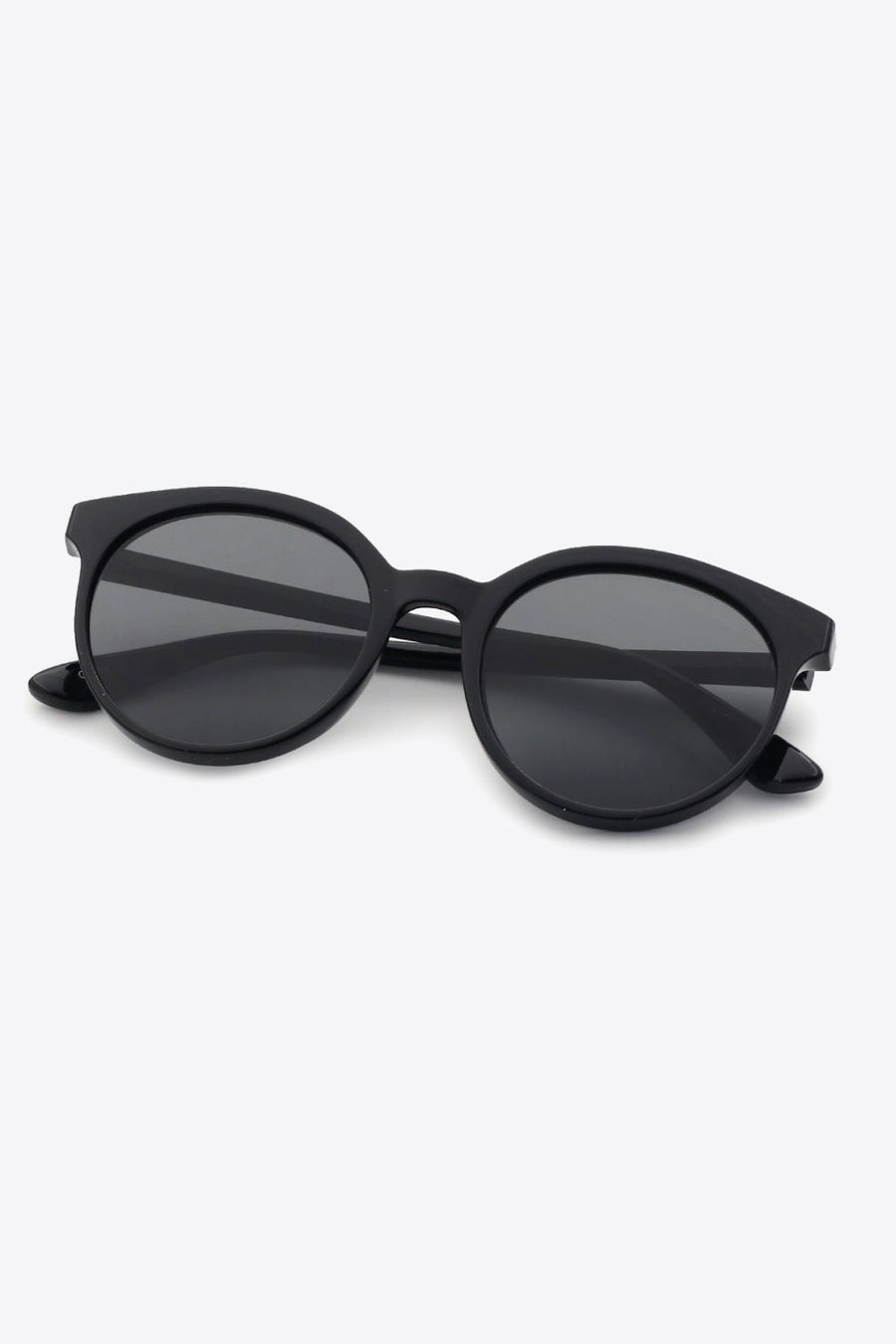 Black round frame sunglasses with dark lenses